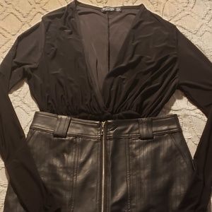 Black v-kneck unitard.